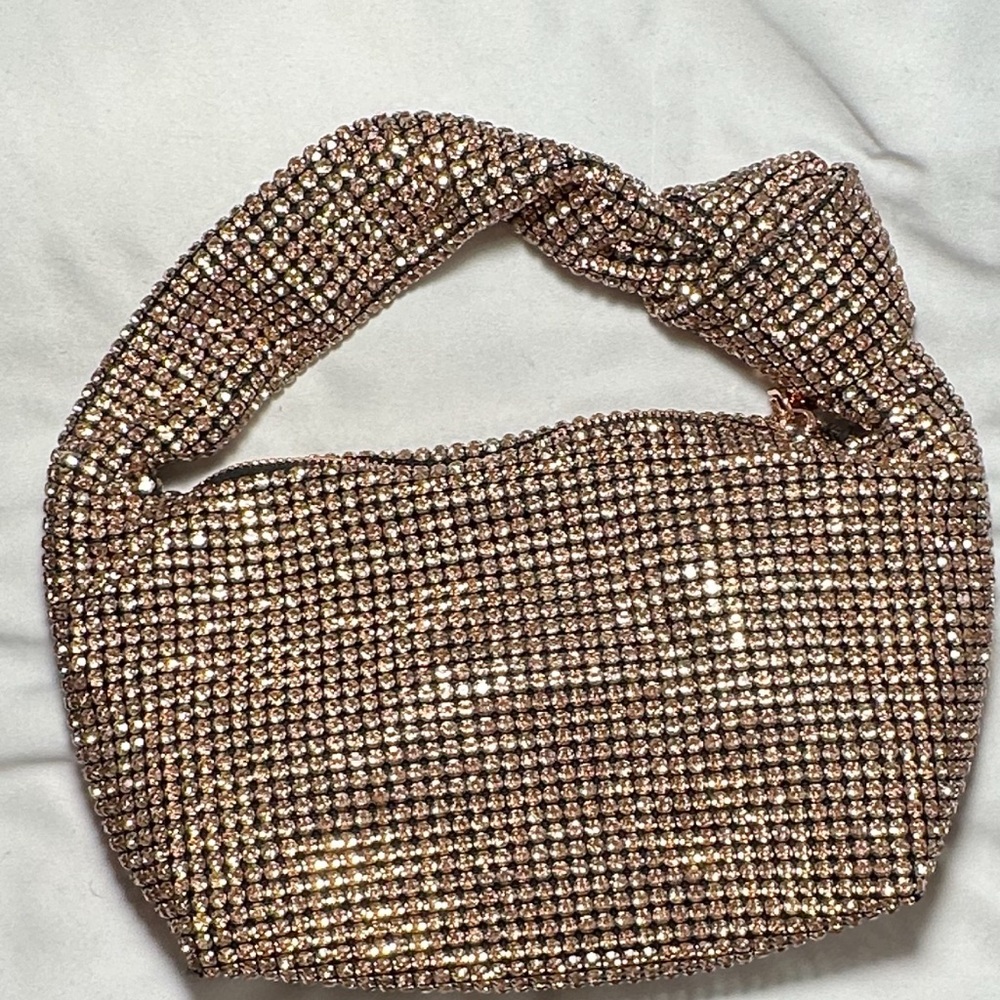 Madison West rose Gold rhinestone clutch
